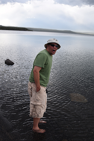 Ray freezing while standing in Yellowstone Lake at Yellowstone National Park