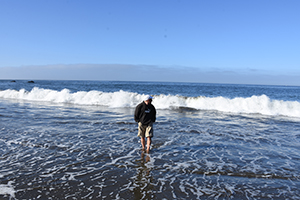 Ray in the waves of Muir Beach in the Marin Headlands