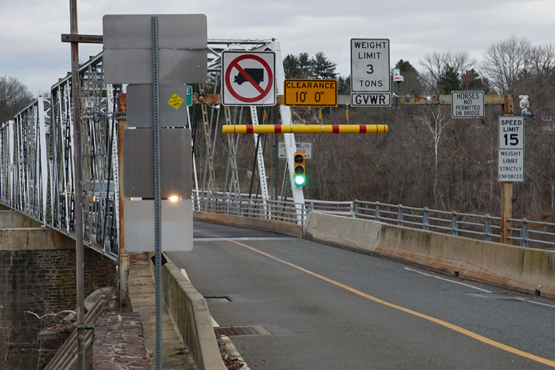 Narrow two lane bridge crossing the Delaware River from New Jersey into Pennsylvania.